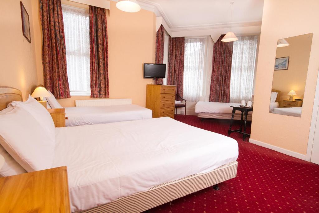 Travelrest Centre Seafront Hotel Борнмът Стая снимка